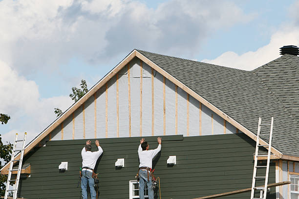 Professional Siding Installation technician working in Poolesville, MD